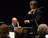 man conducting an orchestra