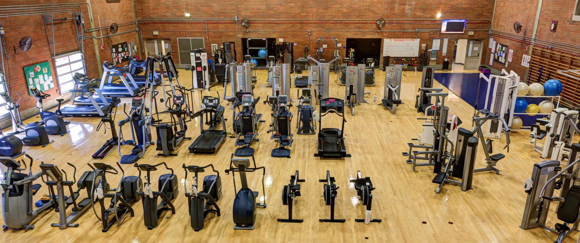 view of the first floor workout equipment taken from the second floor