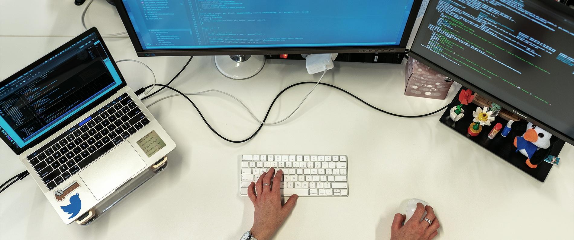 hands at a computer work station
