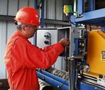 Manufacturing plant electrician working