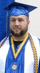 Zach wearing the Honors Program medallion and tassel