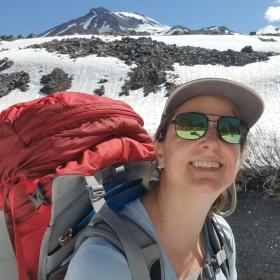 Jean Gipple hiking in the mountains