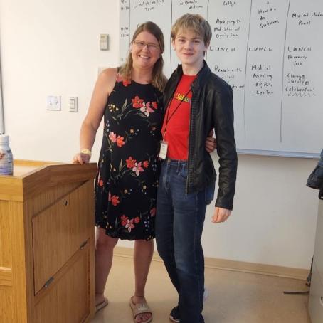Early College advisor Brenda Williams and student Nathan Williams happily pose together