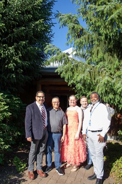 a group of smiling people at MEChA's Celebramos ceremony, including Dr. Pierre Morton, VP of Cultures and Belonging