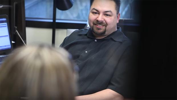 A Human Services program graduate helping a client