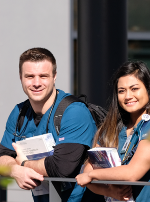 Two students standing outside