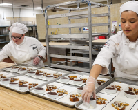 Baking and Pastry student plating pastries for event
